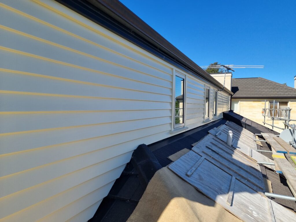 Exterior painting of residential property in white Merivale